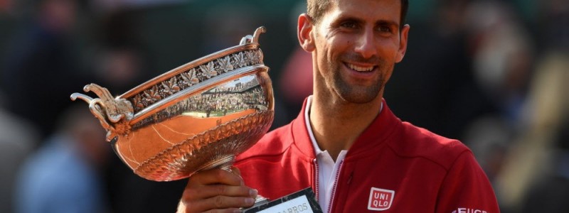 PARIS, FRANCE - JUNE 05:  Champion Novak Djokovic of Serbia poses with the trophy following his victory during the Men's Singles final match against Andy Murray of Great Britain on day fifteen of the 2016 French Open at Roland Garros on June 5, 2016 in Paris, France.  (Photo by Dennis Grombkowski/Getty Images) ORG XMIT: 631081511 ORIG FILE ID: 538276240